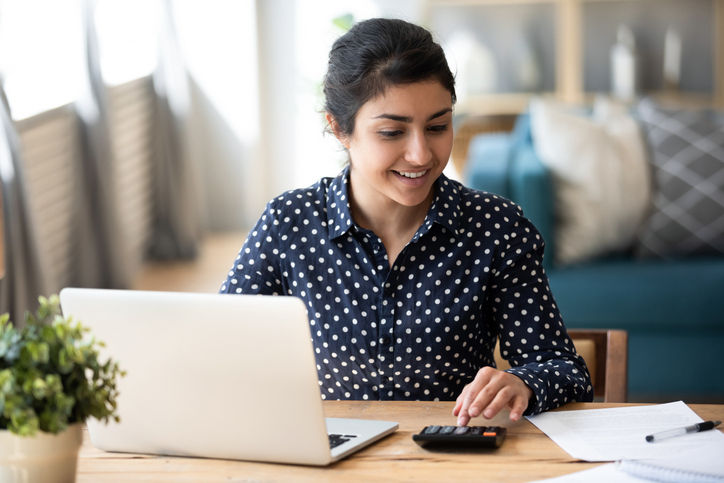 Woman using a calculator