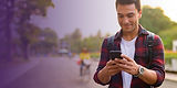 Happy male doing his digital banking on his phone